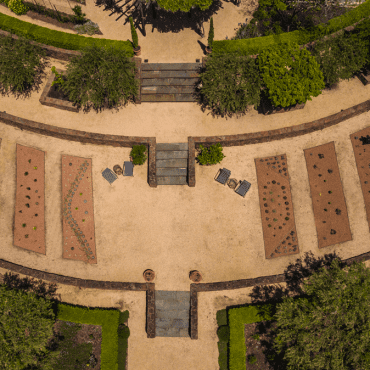 Aerial view of English garden with eight beds converted to a succulent garden