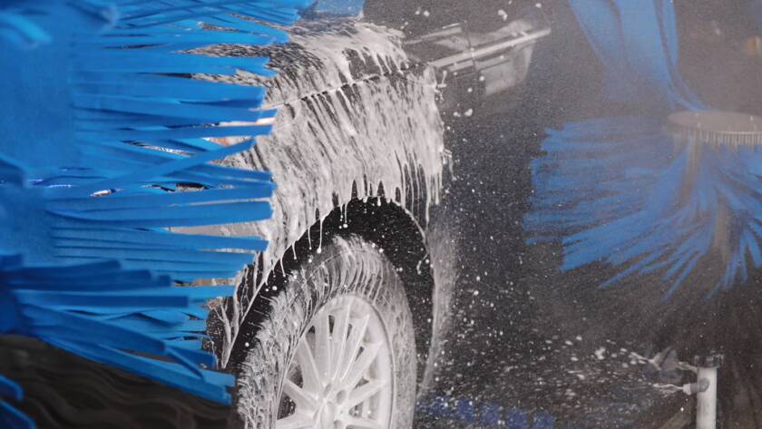 Automated car wash running and washing a car in Springfield Missouri